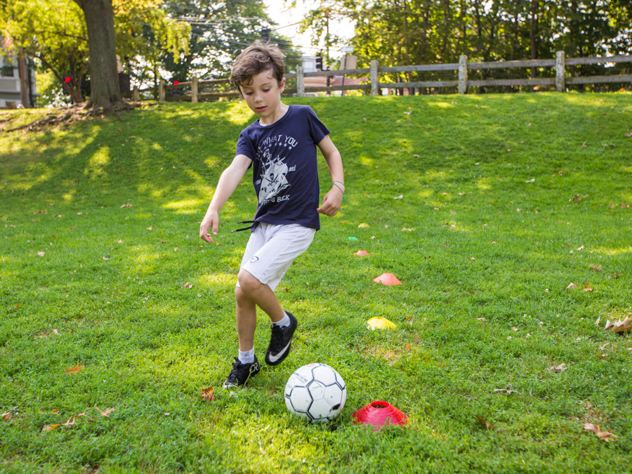 boy-playing-soccer